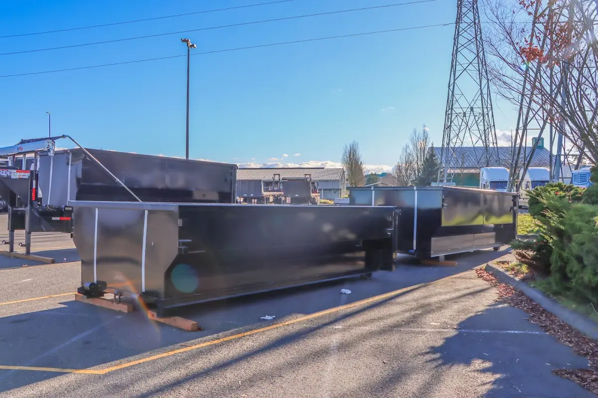 Roll-off dumpster ready for waste disposal at job site for Construction Dumpster Rental in Pitman
